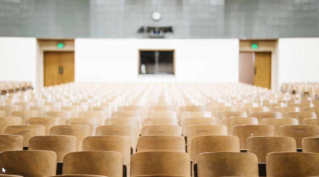 Auditorium with wooden seats